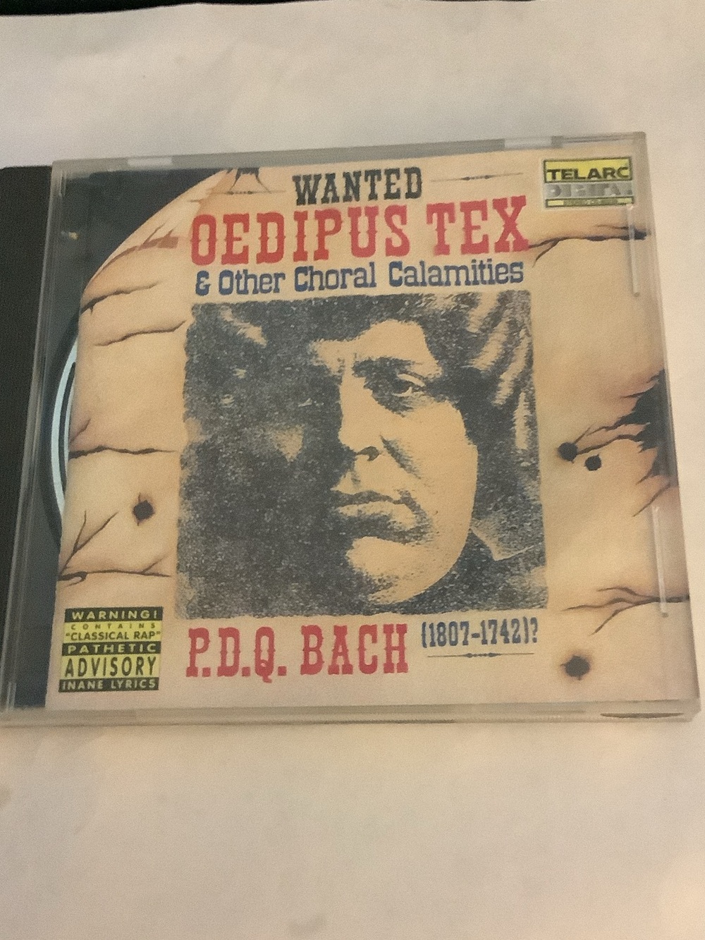 P.D.Q. Bach - Wanted Oedipus Tex & Other Choral Calamities CD (Beige/Black/Red)